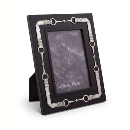 Black photo frame with silver horse‑bit accents around the border, displaying a grayscale horse image.