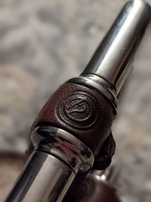 trust bit leather logo