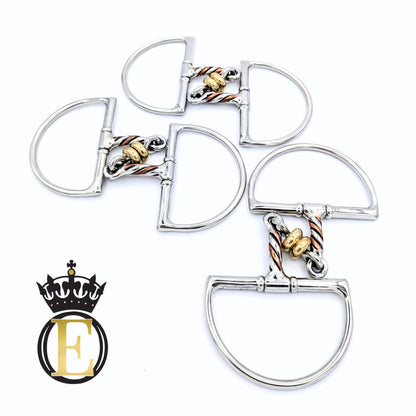 Four silver-toned horse bit hardware pieces arranged on a white background, each with a twisted rope detail in copper, gold, and silver. A black and gold crown logo with the letter E is shown in the bottom-left corner.