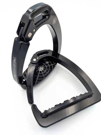 Lightweight aluminum Olympia safety stirrups with quick‑release arm and high‑grip tread. Modern black finish for dressage or jumping performance.