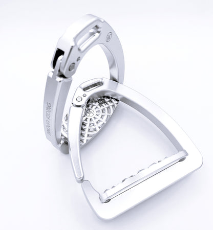 Silver Olympia safety stirrups crafted from lightweight aluminum with quick‑release arm and high‑grip tread. Italian design for dressage or jumping.