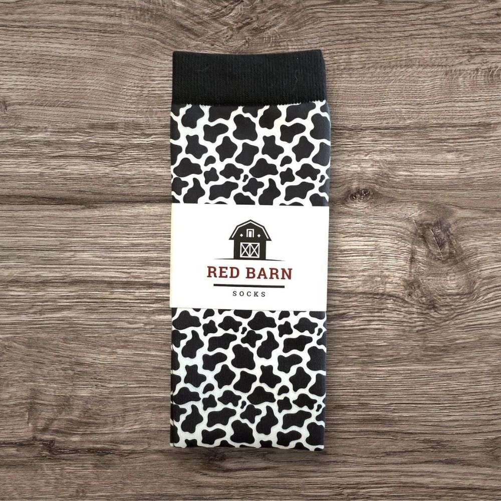 red barn tall socks udderly cozy petite height folded on a wooden background