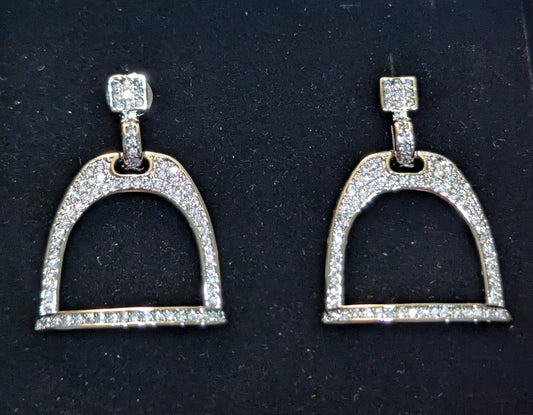 Pair of silver plated english stirrup earrings with pave cz's on a black velvet background