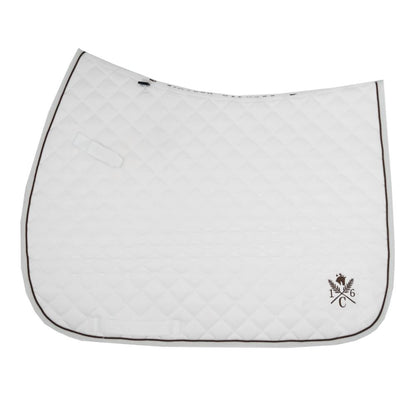 a white sixteen cypress daily sport saddle pad with hickory piping and embroidered design on a white background