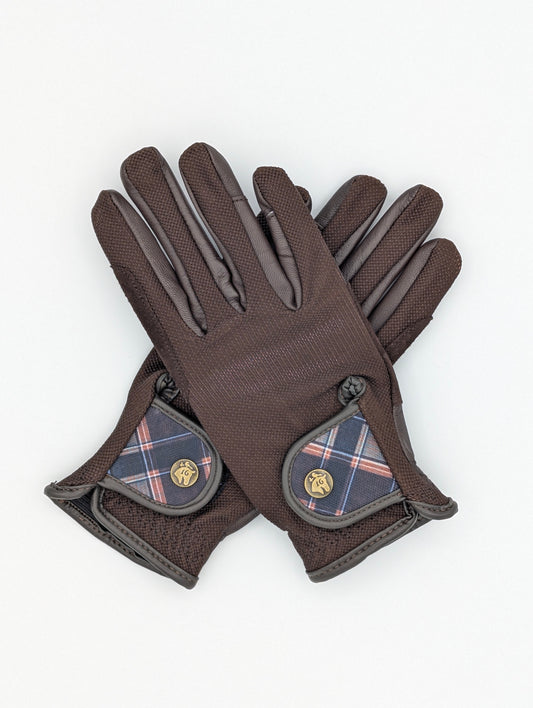 Brown tobacco riding gloves made of breathable mesh and smooth leather, featuring a small Field Plaid wrist tab with a metal button and elastic gathered cuff.