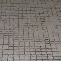 Finished Stall Grid installation with loose top layer spread evenly over the grid surface.