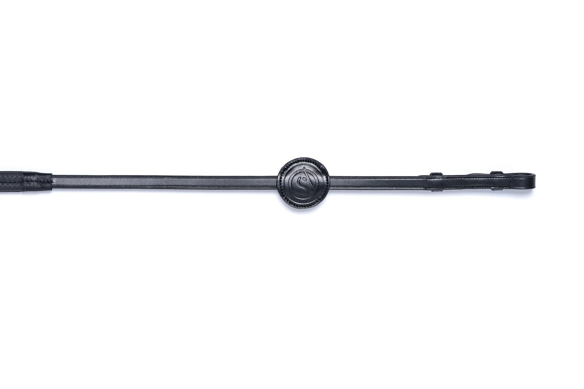 black samorin trust reins with rubber and an embossed leather martingale stop.