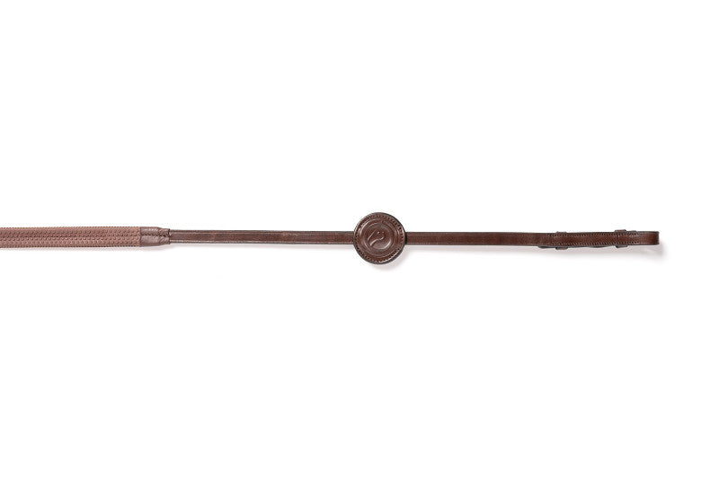 brown trust samorin rubber reins on a white background featuring a stamped leather horse head martingale stop.