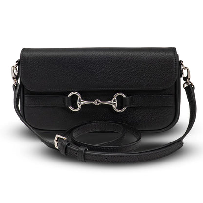 Black pebbled‑leather equestrian‑inspired pochette with a structured rectangular shape, flap closure, silver horsebit hardware, and detachable adjustable leather shoulder strap.