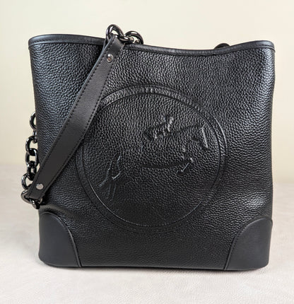 black hunter jumper leather bucket bag made by tucker tweed with chain strap and white background